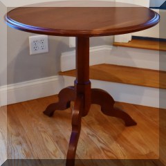 F17. Round cherry side table by Henredon. 26”h x 28”w - $185 